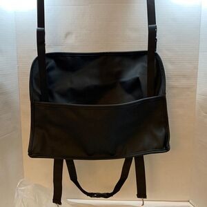 Car seat bag holder. Pocket to hold a large bag and hooks for Crossbody bags